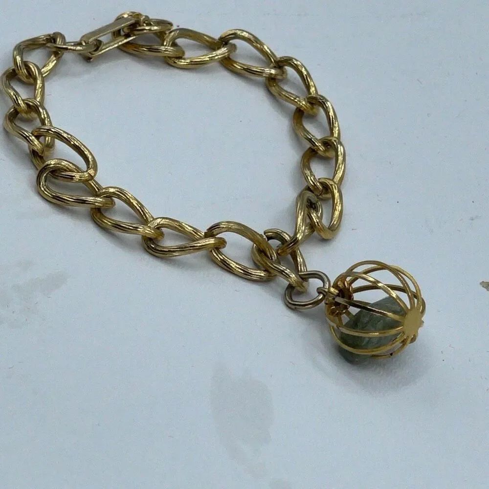 Vintage 6” gold tone large link bracelet w/cage green stone.